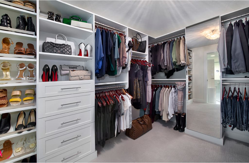 Custom Walk-in Closet in Whole House Remodel in Bonita Springs, FL by Progressive Design Build