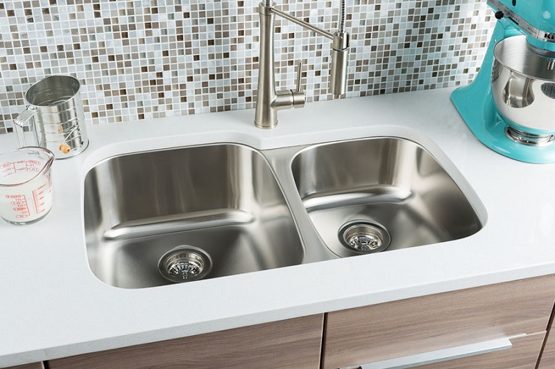 Undermount, divided stainless steel kitchen sink